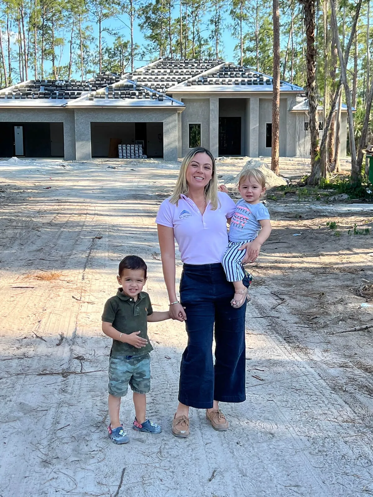 XL Homes team meeting planning custom home construction Naples