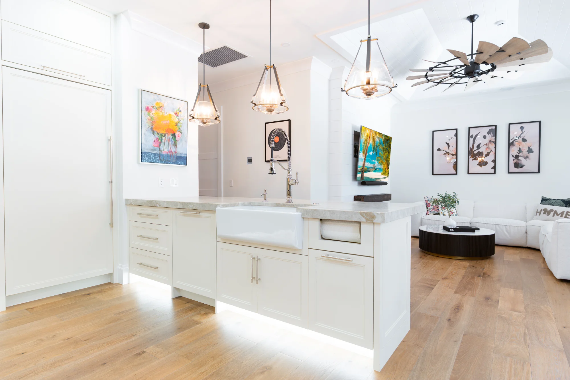 Gourmet kitchen with quartz countertops and custom cabinetry in The Emerald Mediterranean revival home at 210 16th Ave NE, Naples FL by XL Homes custom home builder