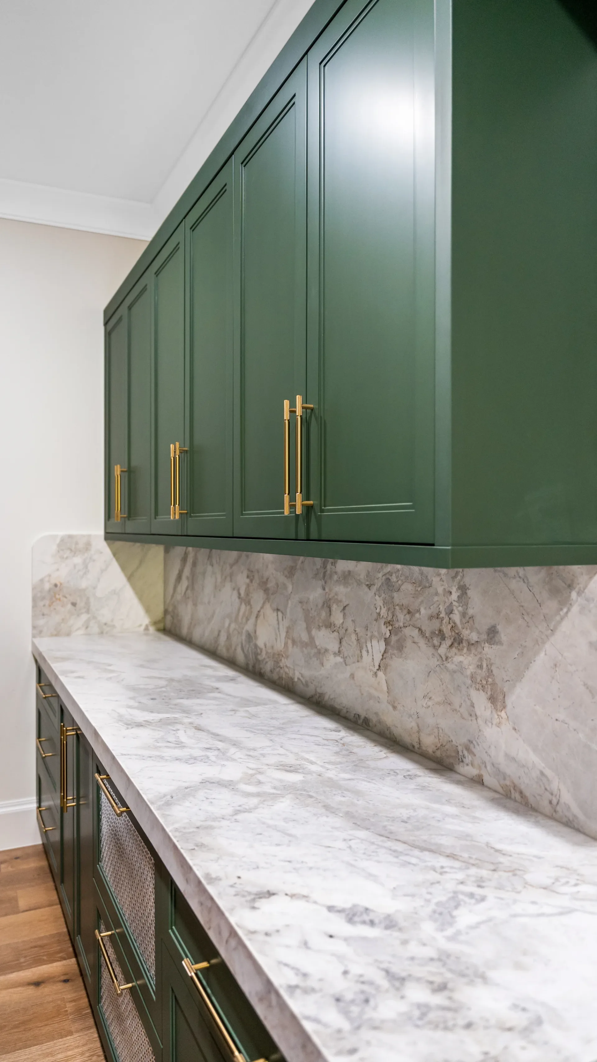 Walk-in pantry with custom shelving and organization in The Emerald Mediterranean revival home at 210 16th Ave NE, Naples FL by XL Homes custom home builder