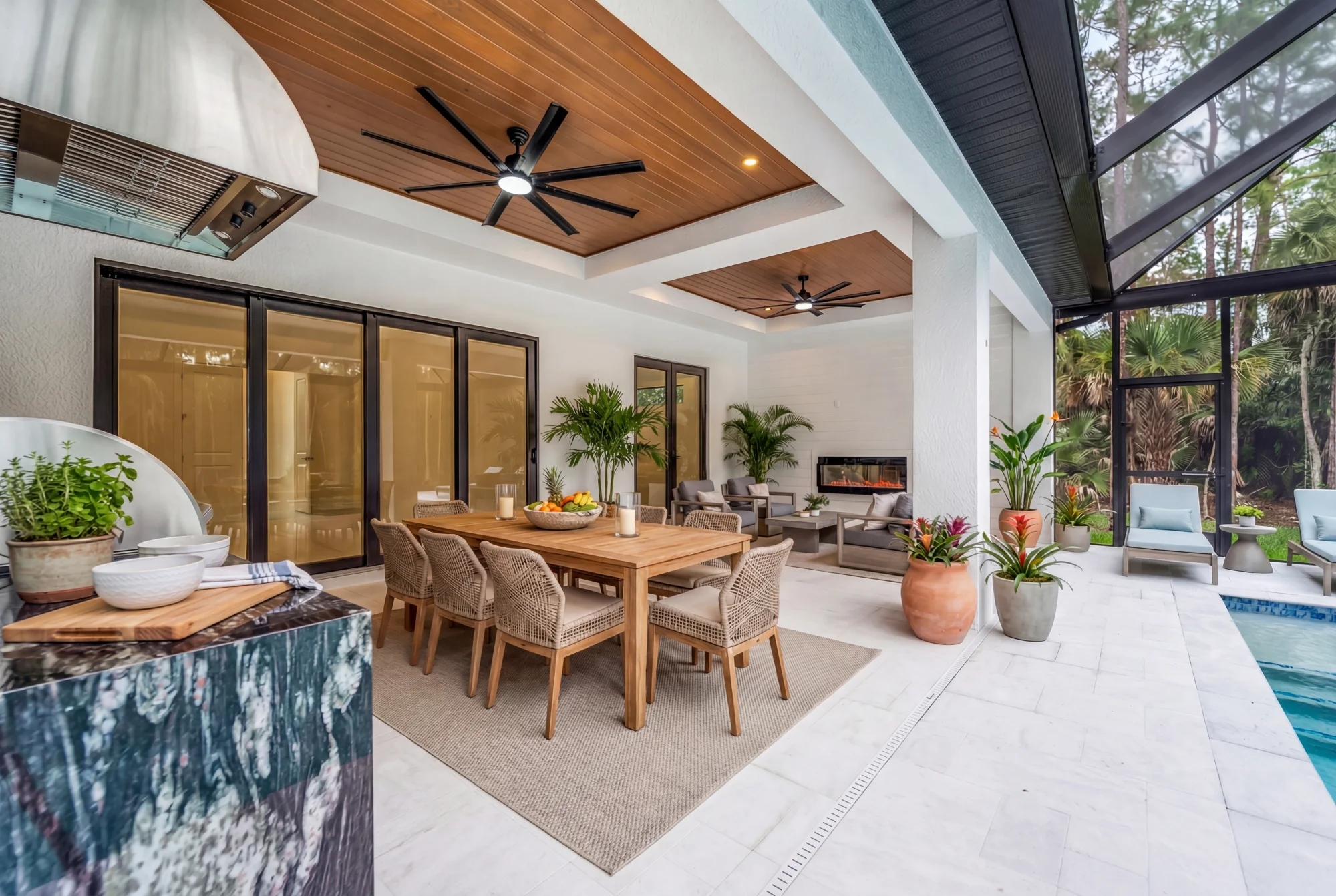 Resort-style pool and screened lanai with outdoor living space in Sunset Golf modern golf estate home at 524 22nd Ave NW, Naples FL by XL Homes custom home builder