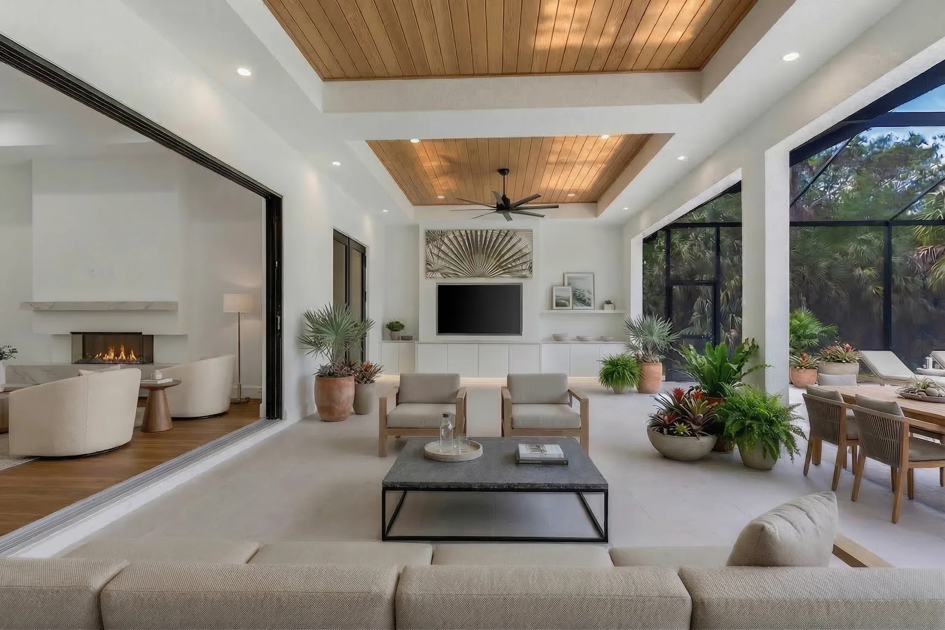 Resort-style pool and screened lanai with outdoor living space in Golden Ridge modern luxury estate home at Naples, FL by XL Homes custom home builder