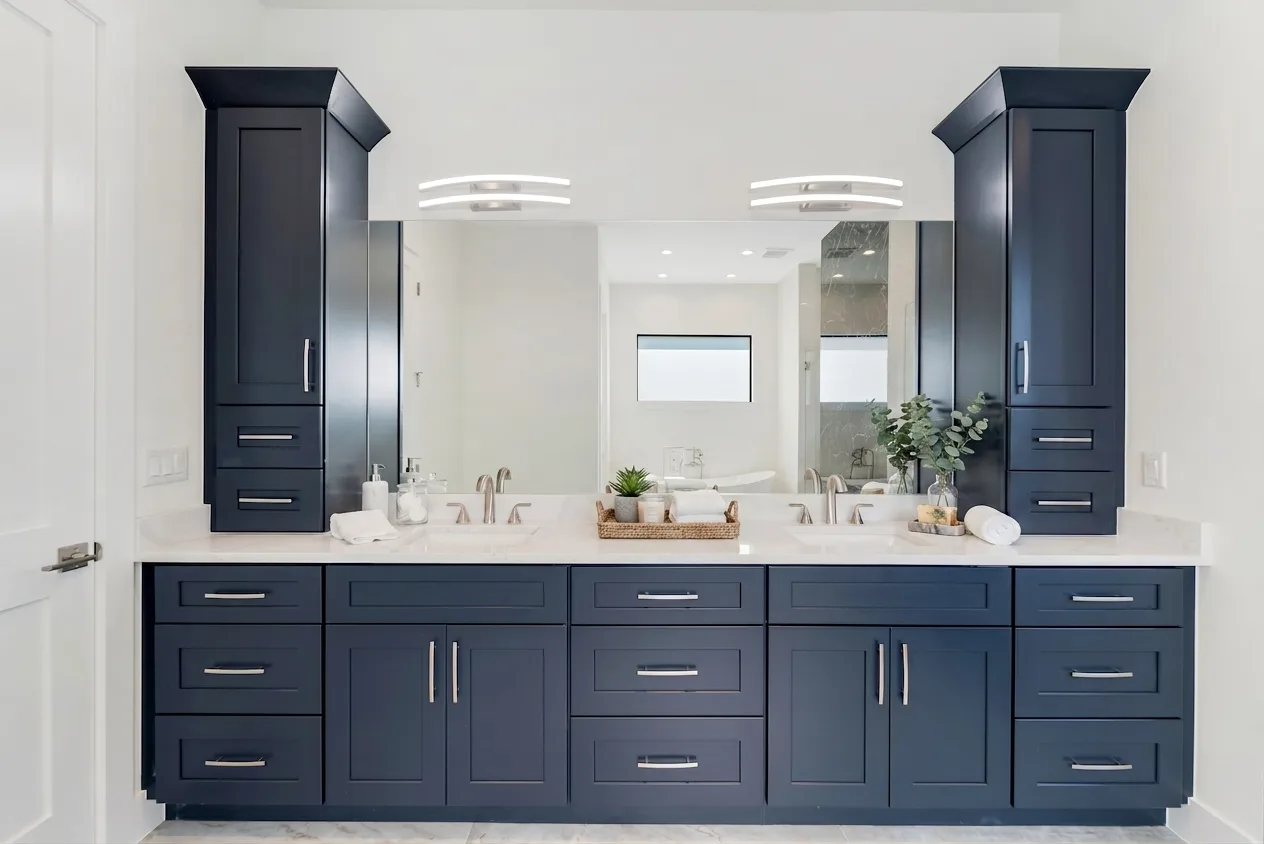 Luxury spa bathroom with marble tiles and designer fixtures in Rookery Bay transitional coastal luxury home at Naples, FL by XL Homes custom home builder