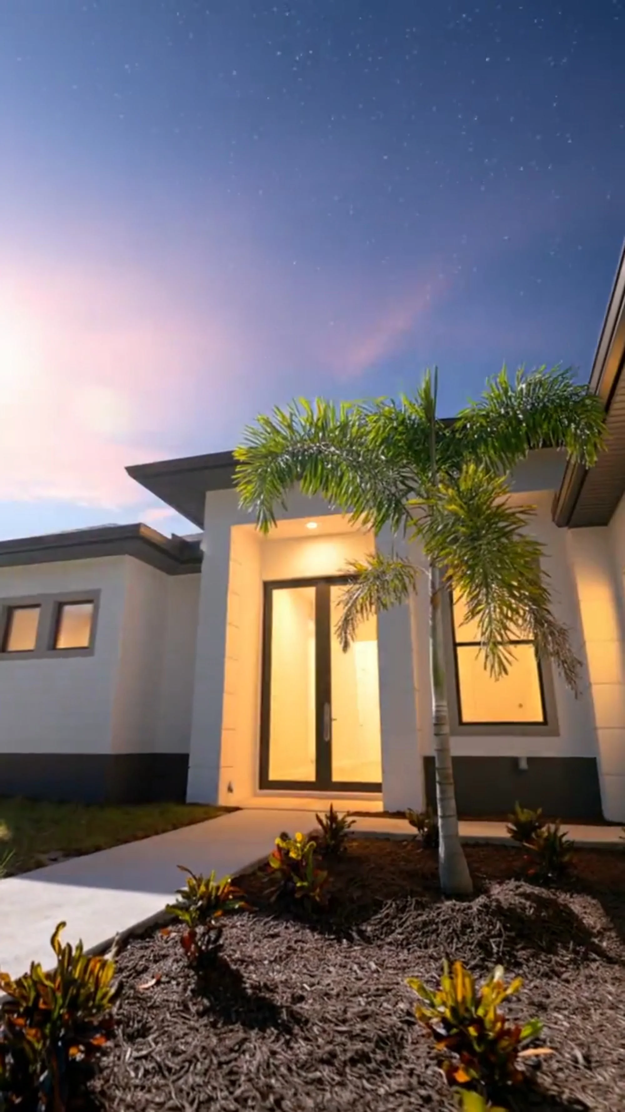 Property video tour of luxury custom home in The Sapphire contemporary waterfront home at 619 22nd St SE, Naples FL by XL Homes custom home builder