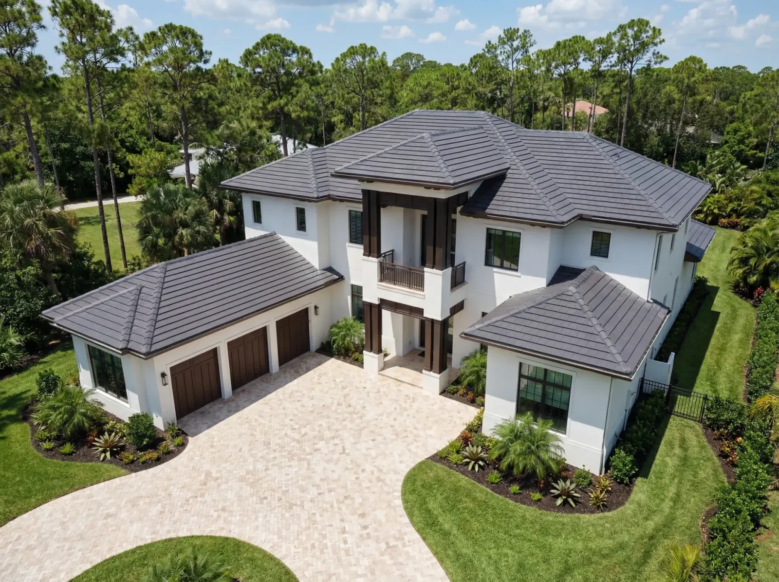 Aerial drone view showcasing luxury estate and neighborhood in Custom Residences luxury custom home at Naples, FL by XL Homes custom home builder