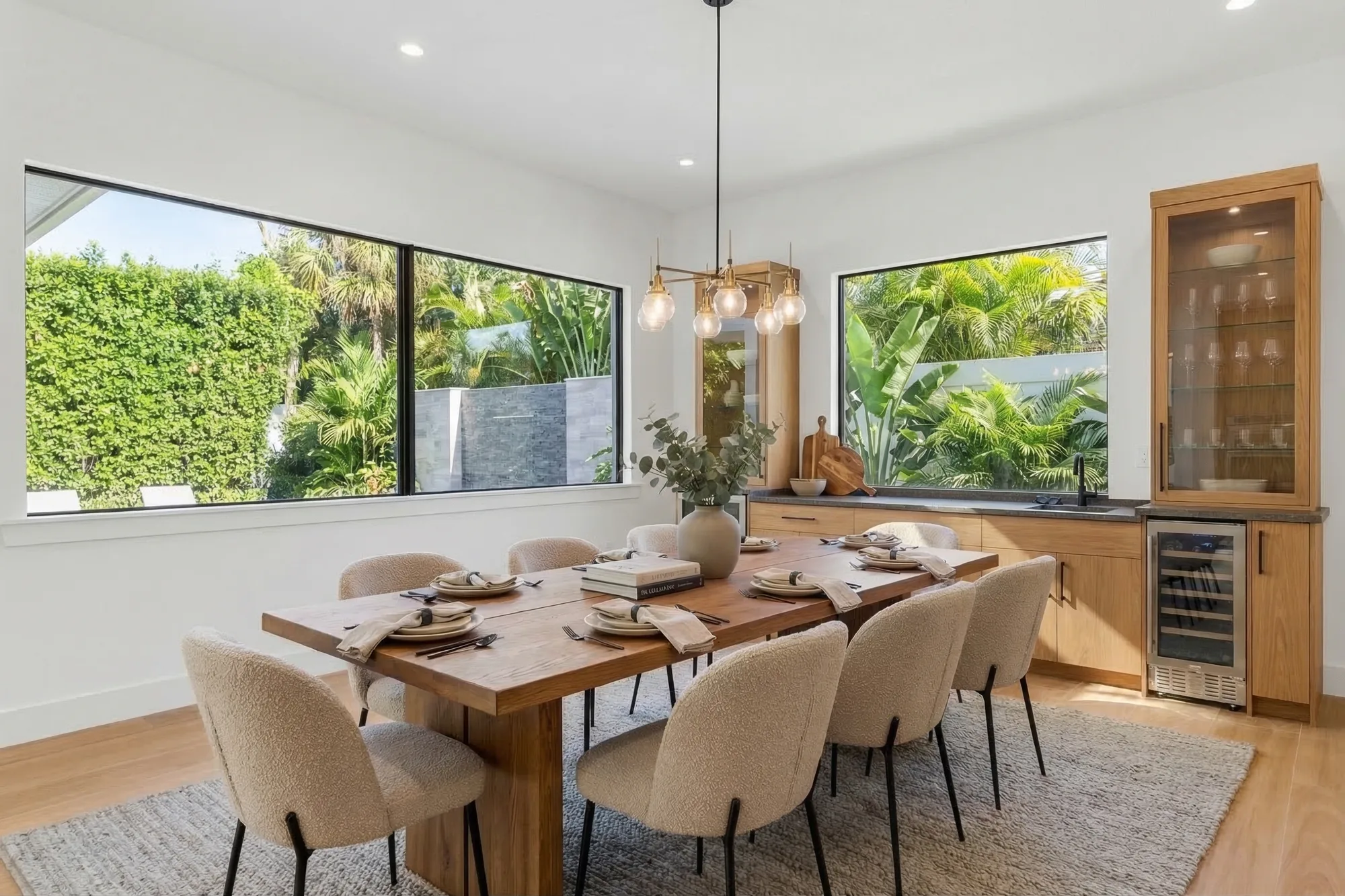 Elegant formal dining room with coffered ceiling in Remodeling Projects high-end remodeling home at Naples, FL by XL Homes custom home builder